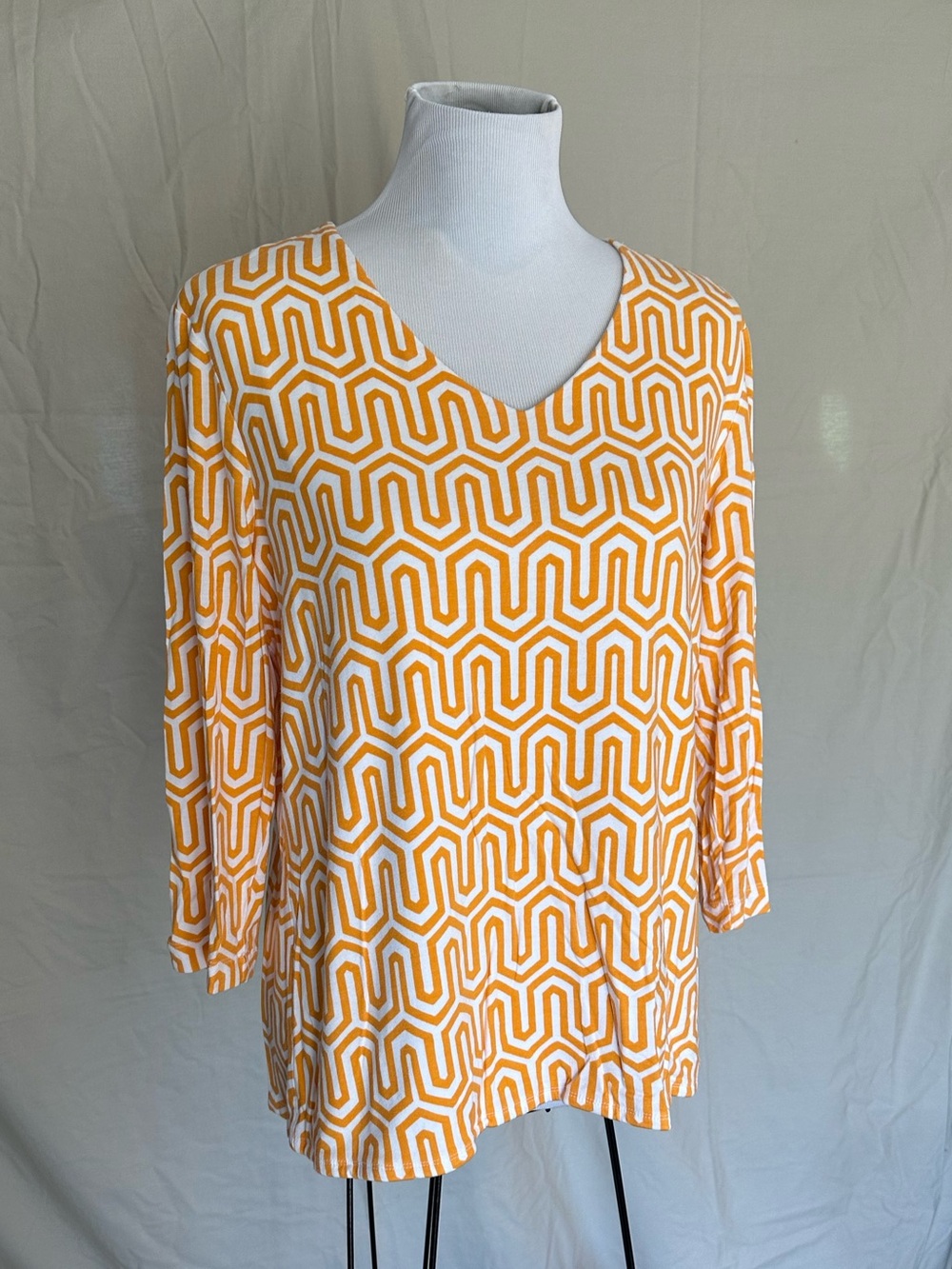 Chico's Geometric V-Neck Top Chico’s orange and white blouse size 2 large
